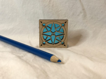 val lynn seaside stained glass compass rose in turquoise with art pencil